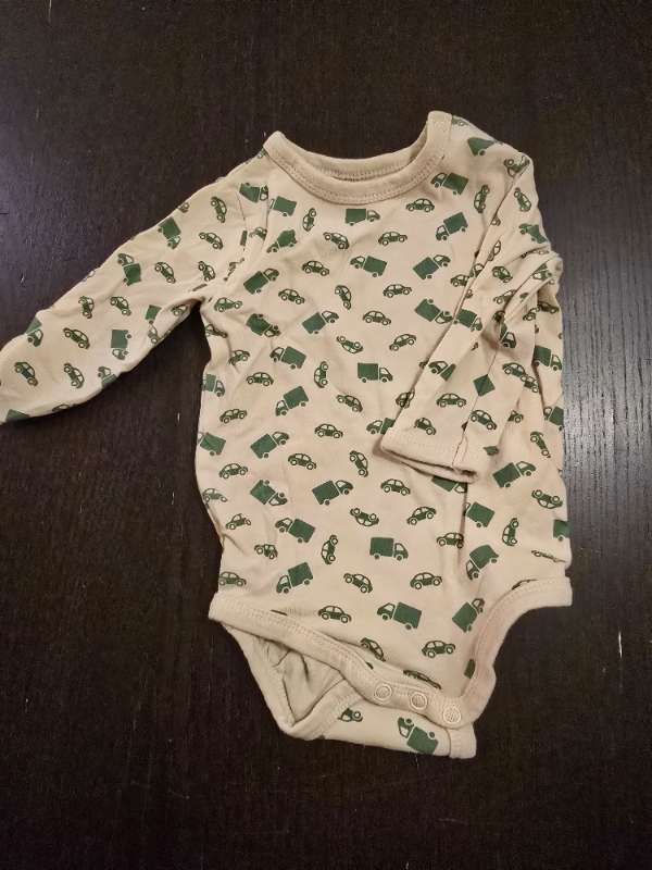 Beige body med gröna fordon