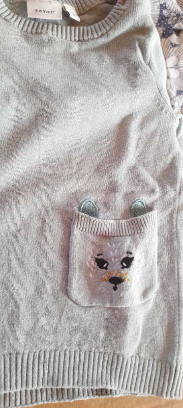 Tunika m djur på fickorna