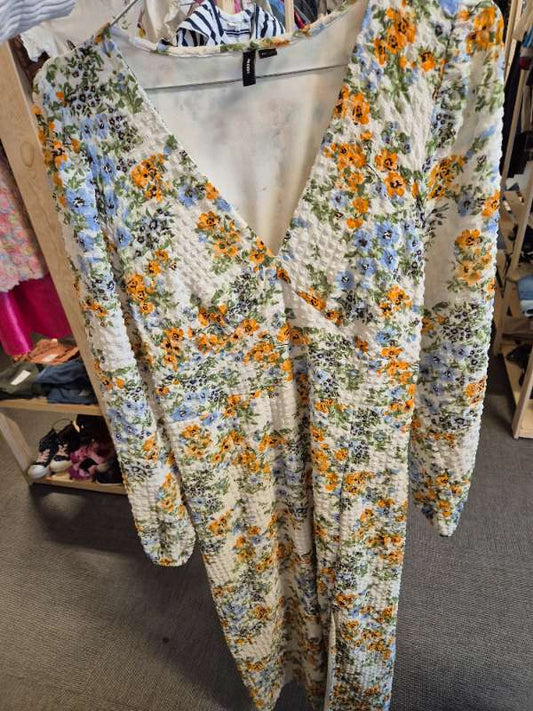 Blommig blå orange klänning