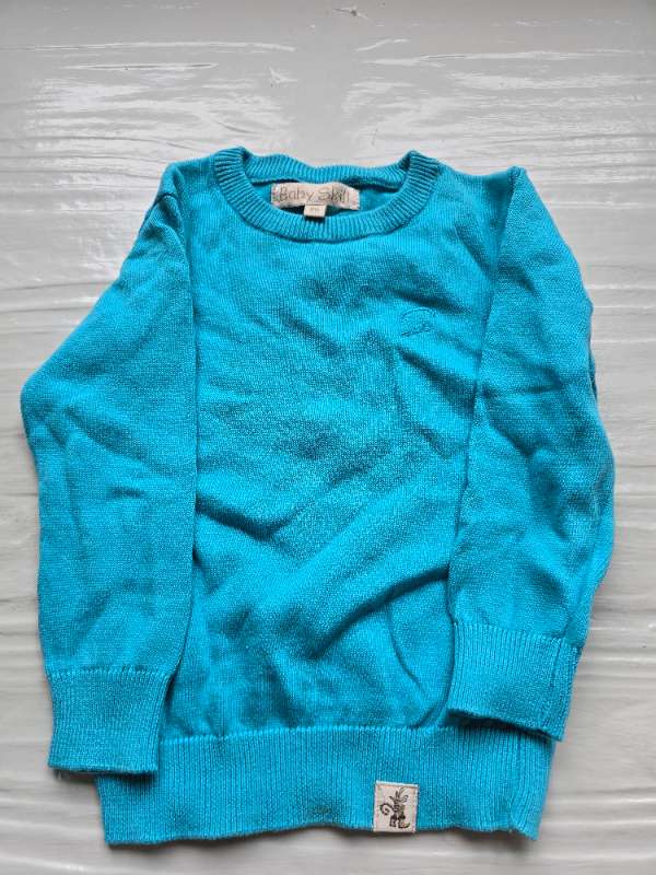 Turkos stickad tröja