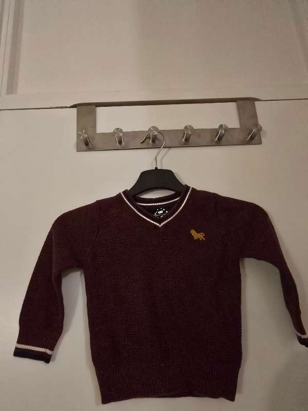 Mörkröd stickad polo