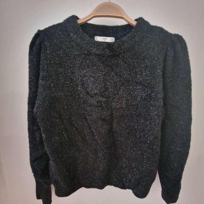 Stickad glittrig tröja