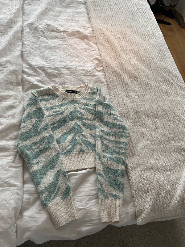 Stickad tröja
