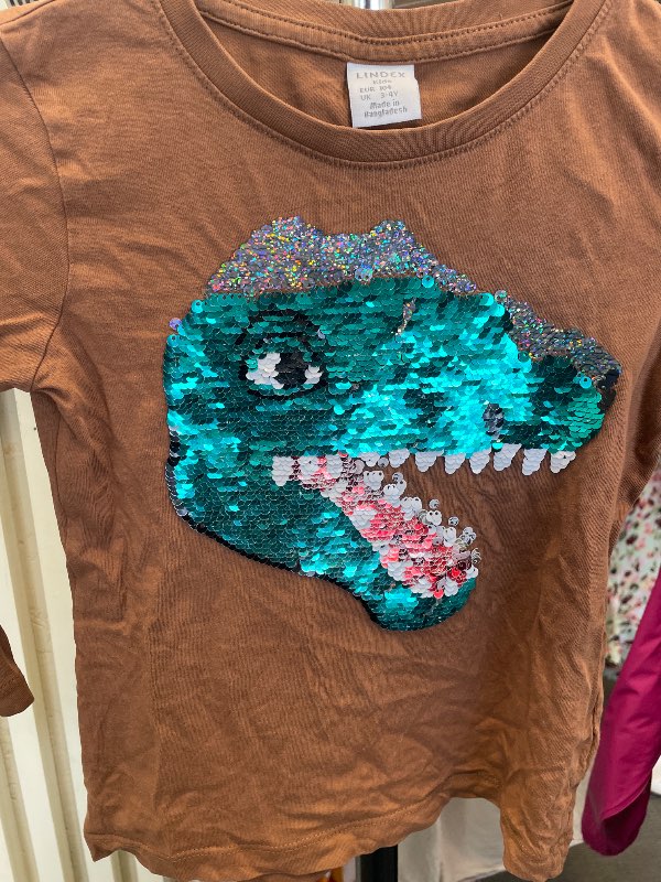 Lindex paljett dinosaurie brun