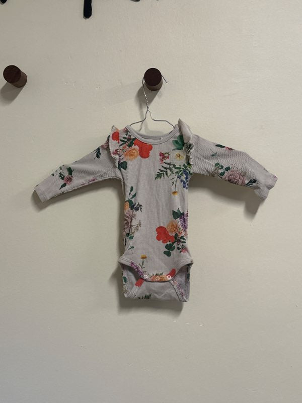 Name it body blommig